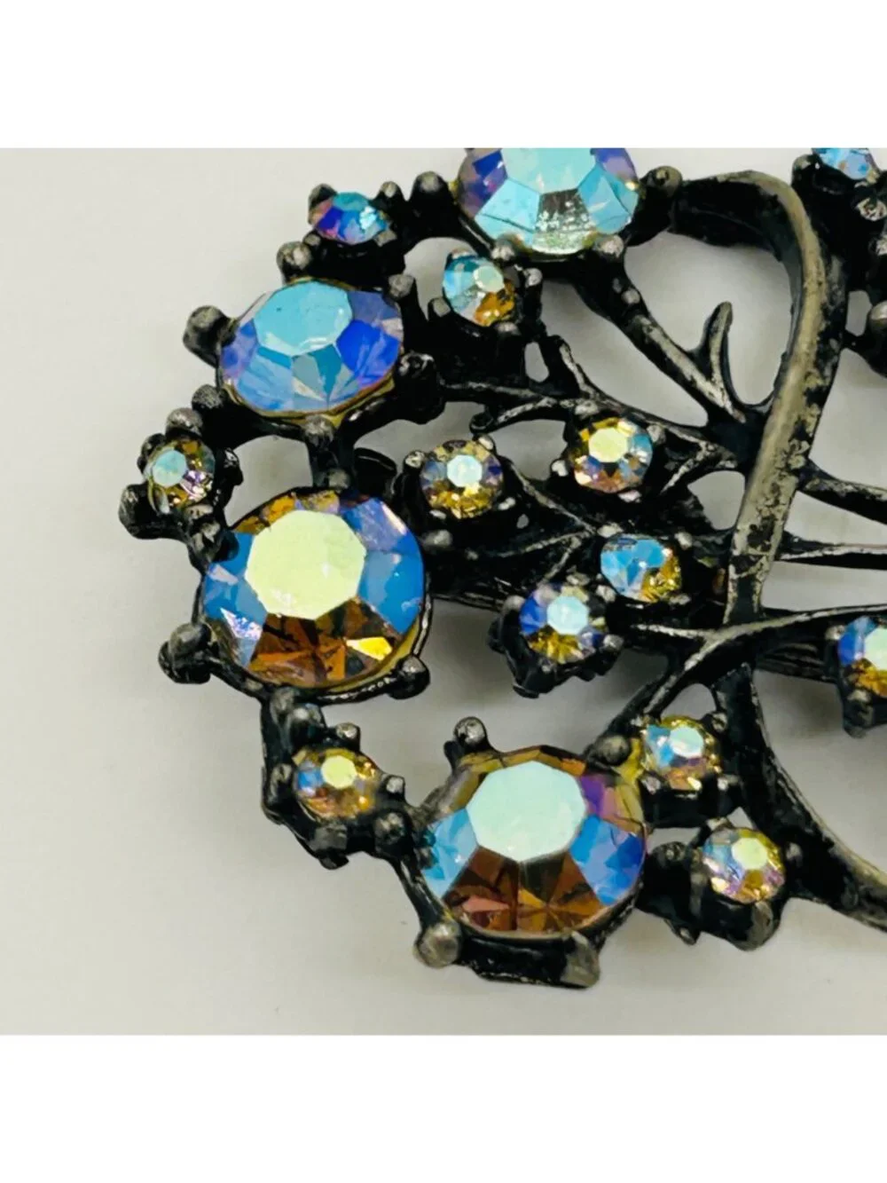 Vintage Aurora Borealis Rhinestone Brooch Peacock Colored Pin Gunmetal